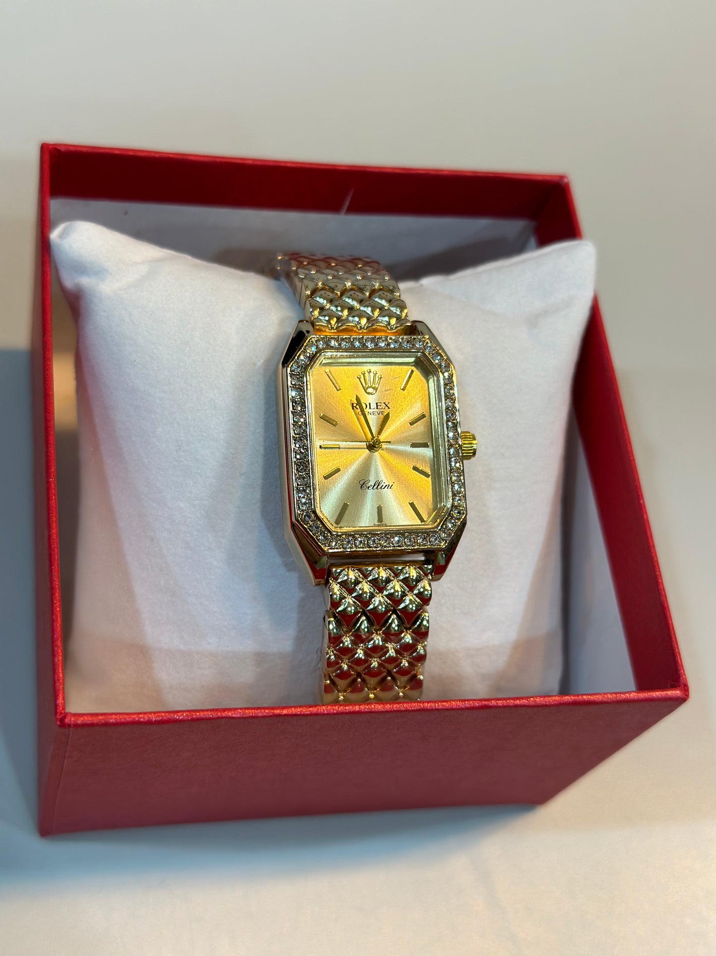 Reloj R Dorado